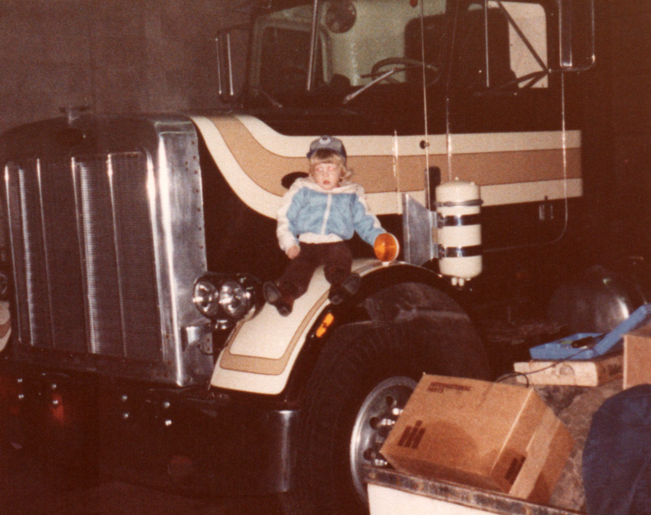 Child at the wheel of a Jusczak truck